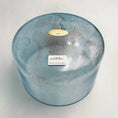 Load image into Gallery viewer, Large blue crystal sound bowl with a label on a white background