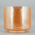 Load image into Gallery viewer, Orange crystal sound bowl with 'Crystal & Tones' branding on a gray background