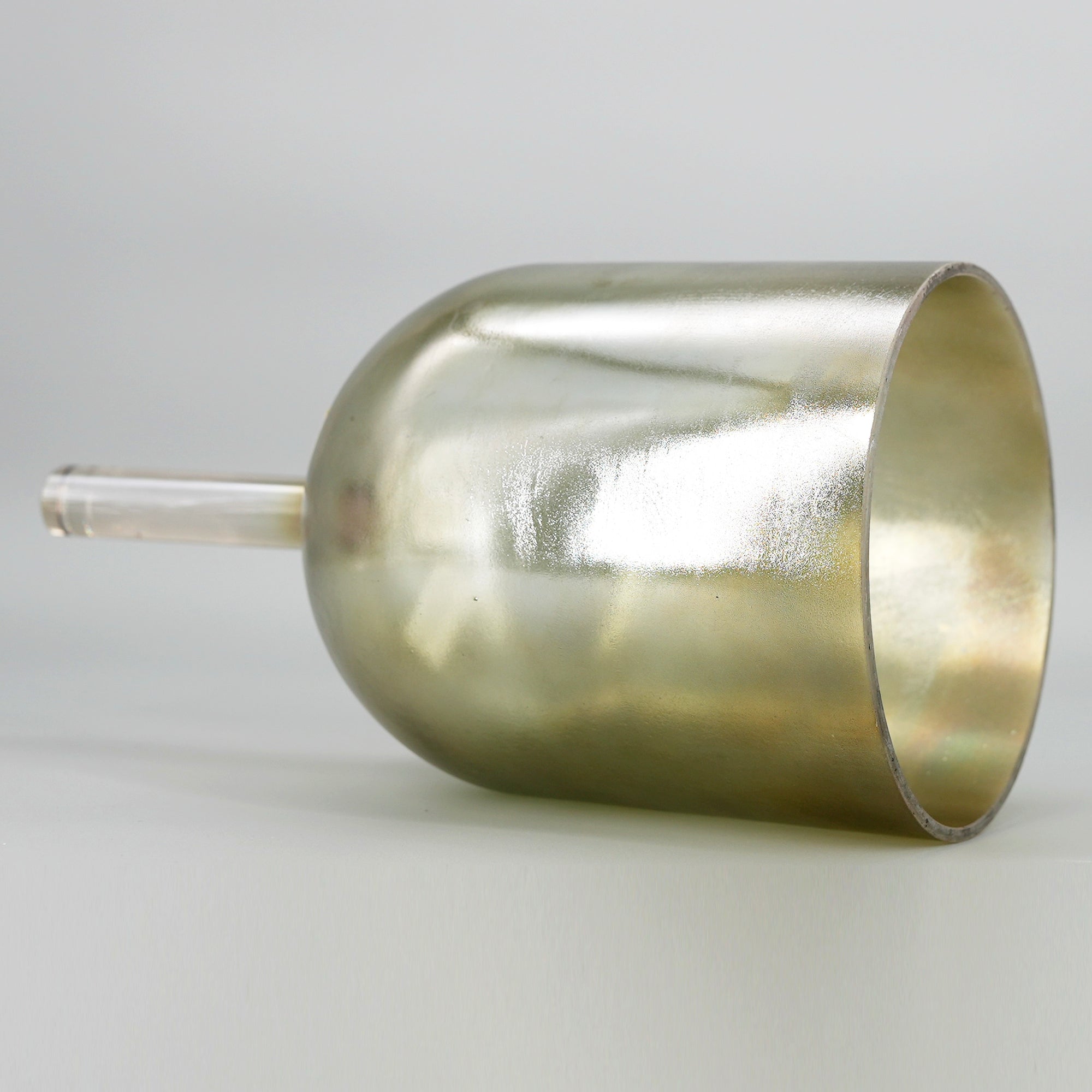 Metallic gold practitioners Crystal sound bowl on a light gray background