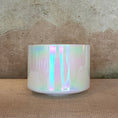 Load image into Gallery viewer, Iridescent Crystal Sound Bowl on a textured surface

