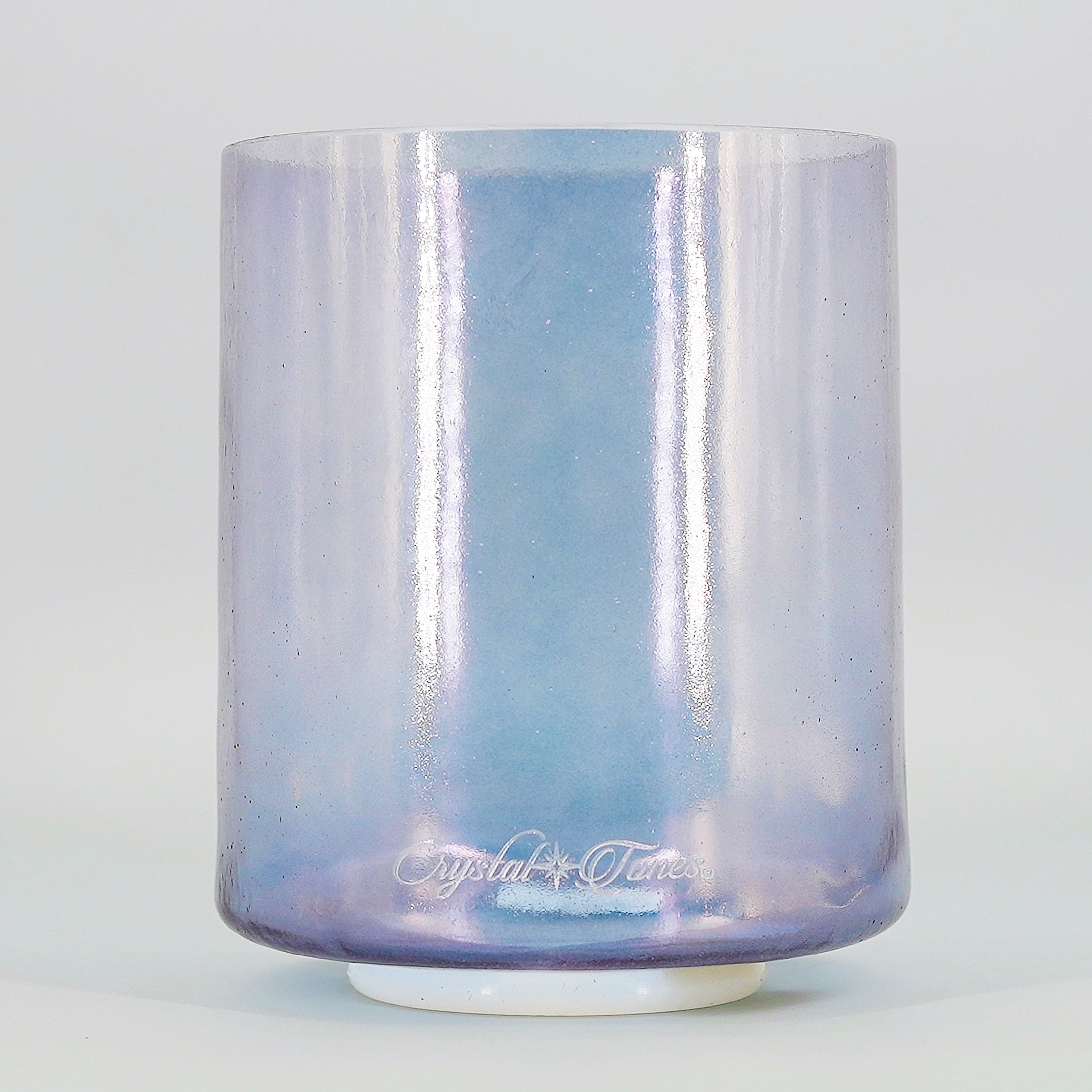Iridescent crystal sound bowl with 'Crystal & Tones' branding on a light gray background