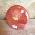 Load image into Gallery viewer, Red Crystal Sound Bowl item with a gold Crystal Tones label on a textured surface
